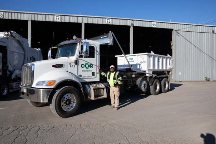 COR-Founder-Al Simpson-Roll-off-Waste-Recycling-Truck